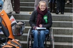 Saraj Whitchurch, wheelchair athete, waits for States members